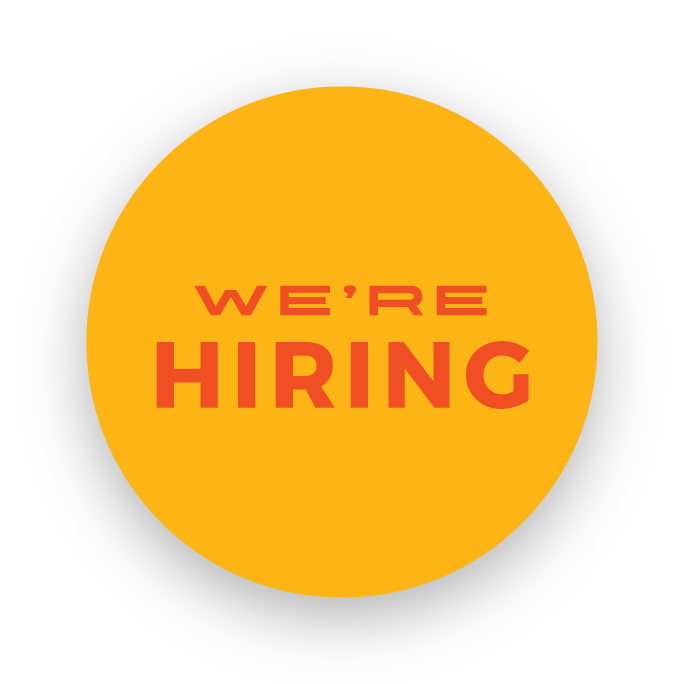 Yellow circle with the words "We're hiring" in orange sans-serif type.